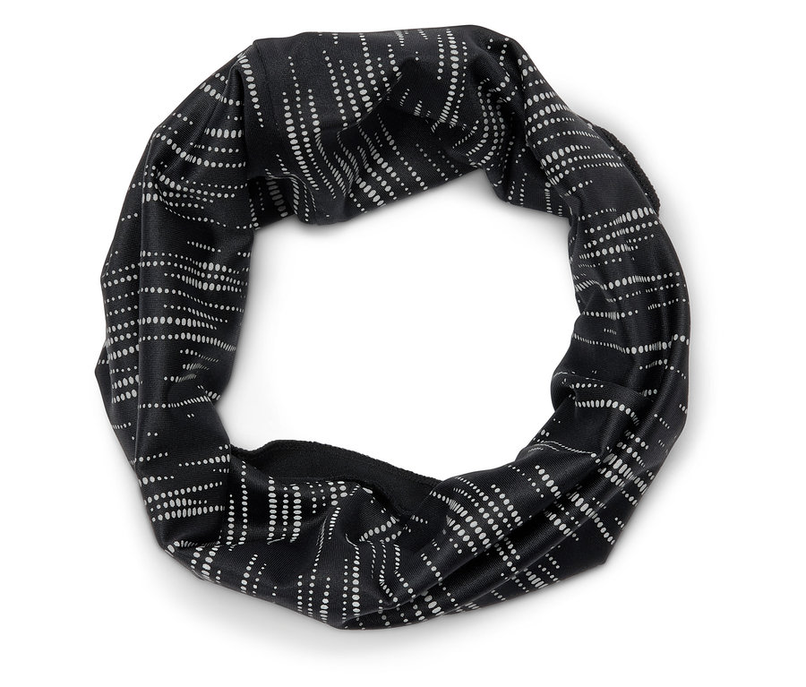 Schwarzes Stirnband mit weißem Punktmuster.