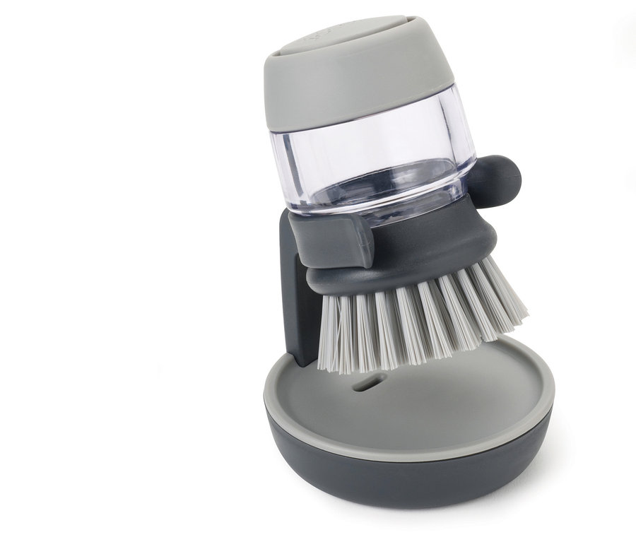 Graue Joseph Joseph Spülbürste mit Spülmittelspender.
