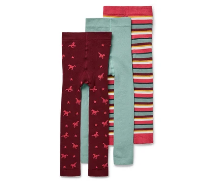 Drei Kinderleggings: bordeauxrot mit Sternen und Pferden, hellblau und gestreift.