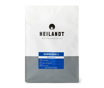 Weiße Verpackung von Heilandt Espresso 1 - 1 kg Ganze Bohne, mit blauem Etikett.
