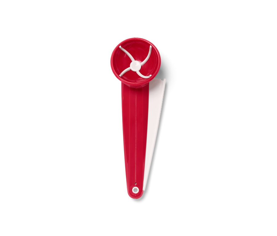 Ein roter Keks-Portionierer mit weißen Elementen auf einem weißen Hintergrund.