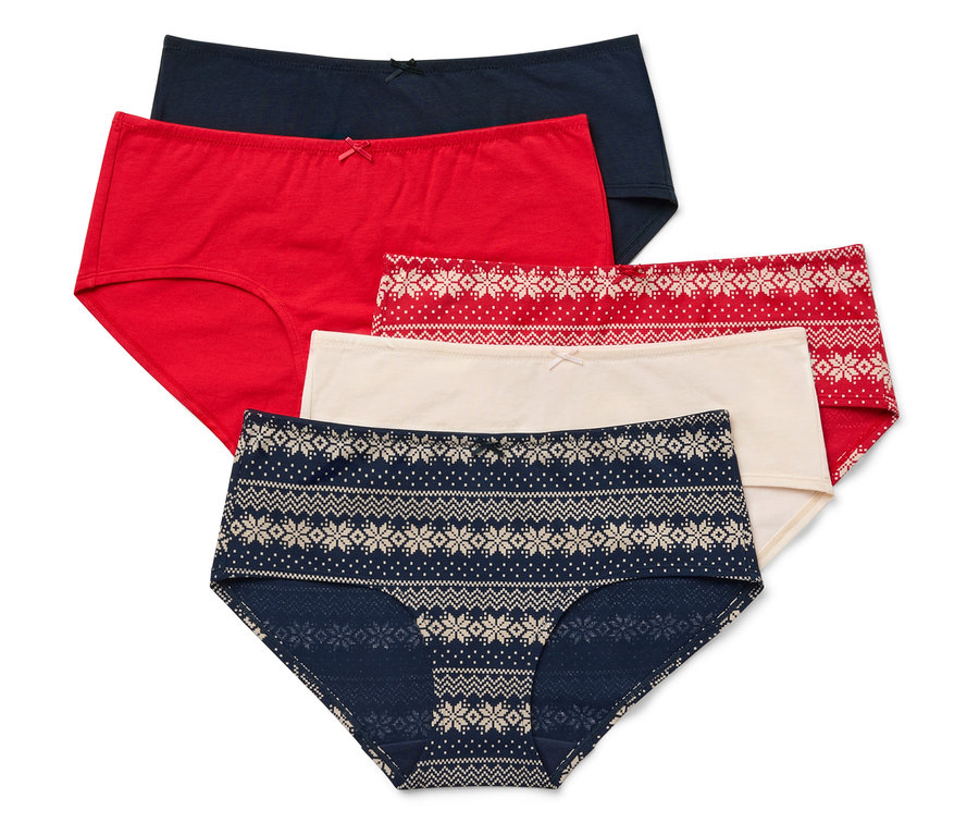 Fünf Damenslips in verschiedenen Farben und Mustern liegen übereinander.