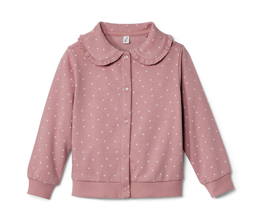 Rosa Kinder-Sweatjacke mit Volant und weißen Punkten.