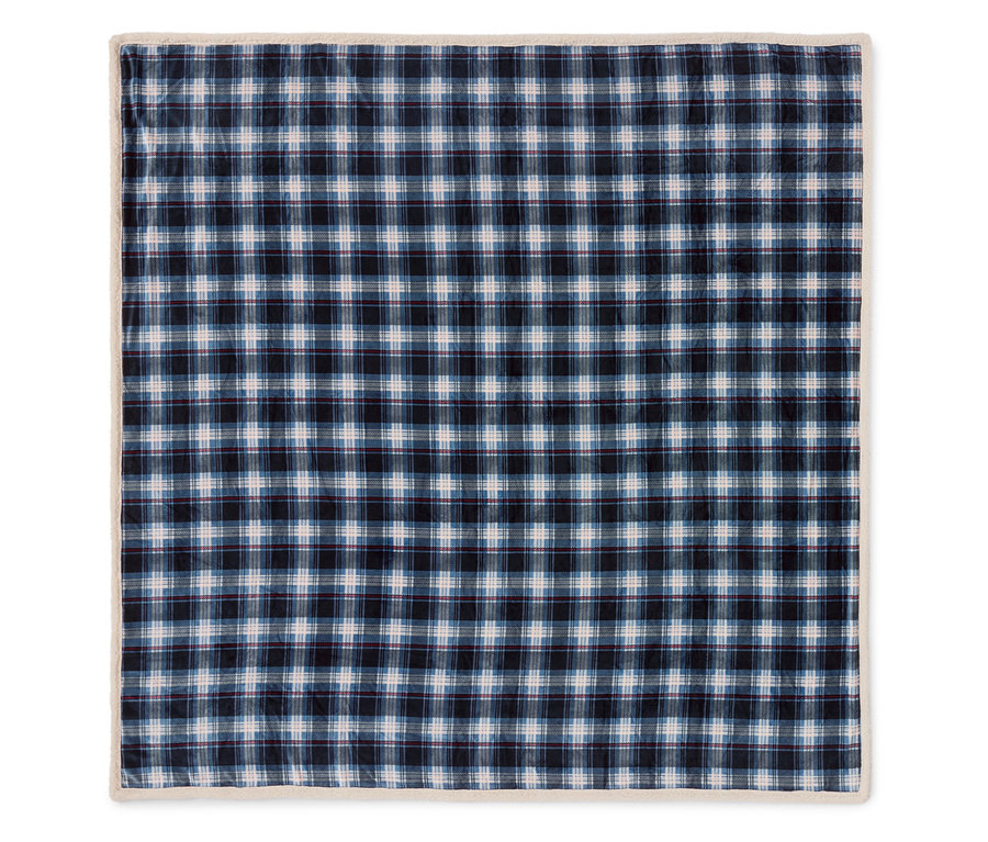 Eine blau karierte Decke mit cremefarbenem Rand.