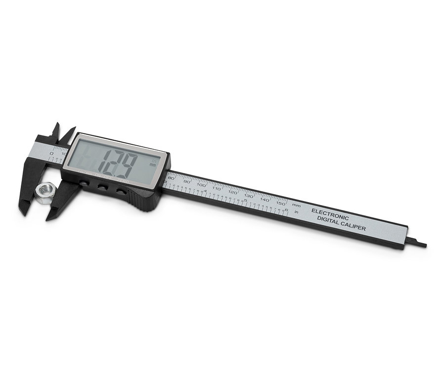 Ein Digitaler Messschieber misst eine Mutter.