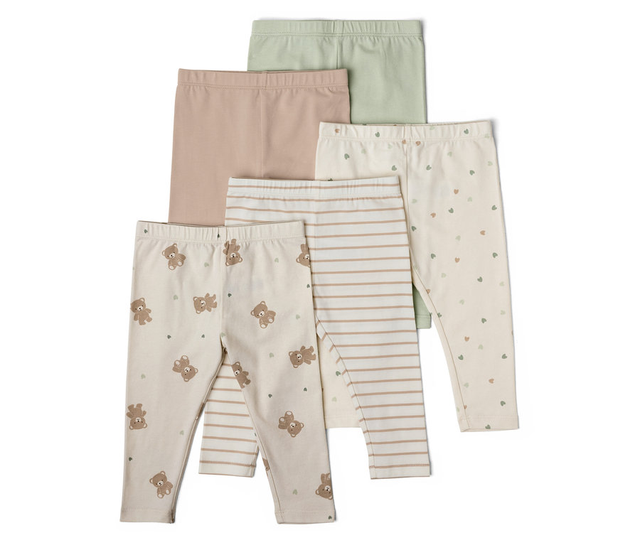 Fünf Baby Leggings in Grün, Beige, mit Bären, Streifen und Herzchen Muster liegen übereinander.