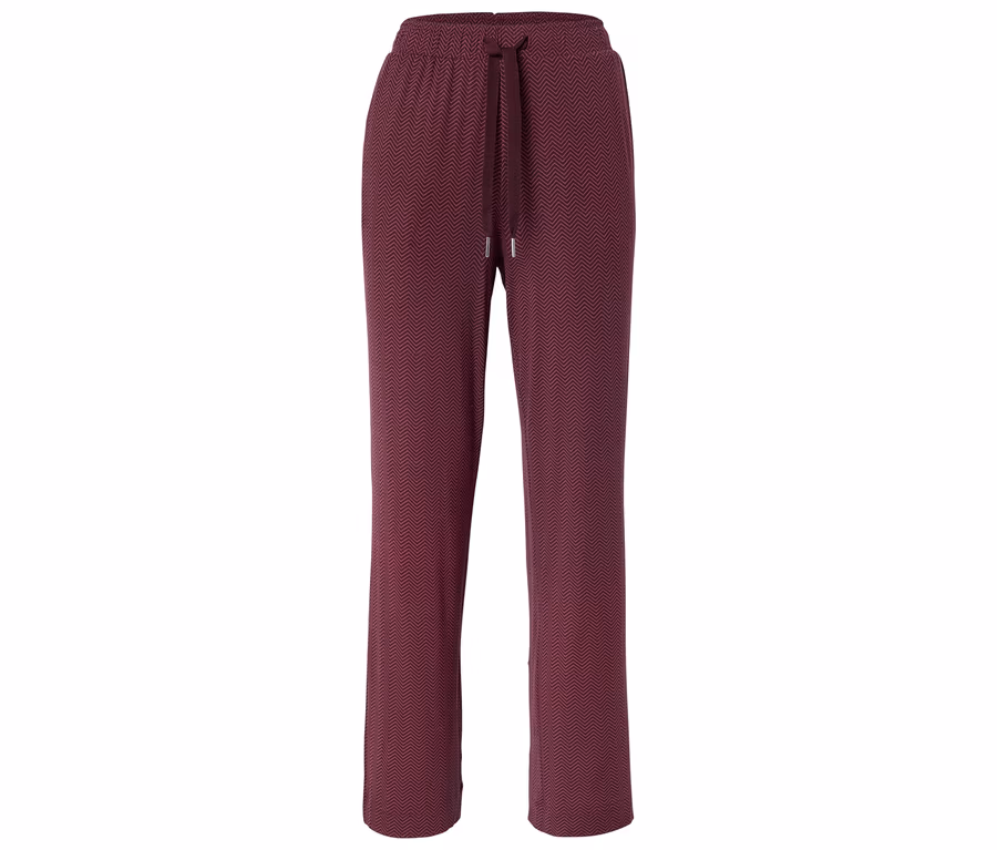 Eine weinrote Hose mit Kordelzug und Zickzackmuster ist vor einem weißen Hintergrund zu sehen.
