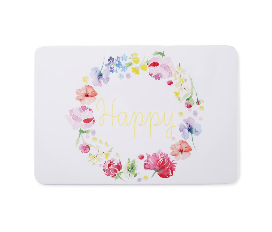 Weißes Schneidebrett mit Blumenkranz-Muster und dem Wort Happy.