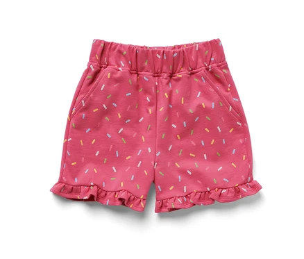 Pinke Kinder-Sweat-Shorts mit bunten Streuseln.