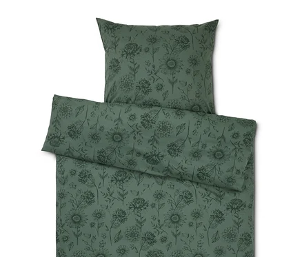 Grüne Bettwäsche mit Blumenmuster, inklusive Kissen und Bettdecke.