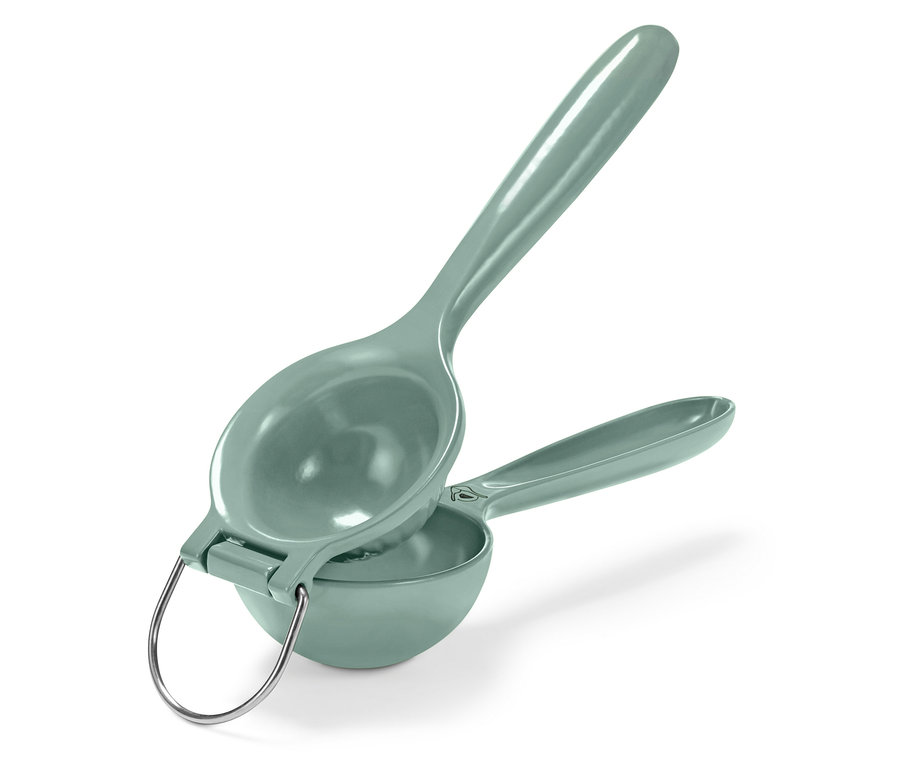 Eine grüne Zitruspresse mit silbernem Griff.