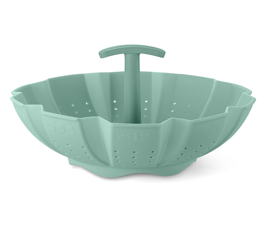 Ein grüner Silikon-Dämpfeinsatz mit einem Griff in der Mitte.