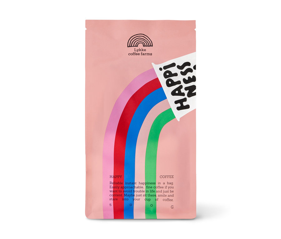 Rosa Kaffeepackung von Lykke mit Regenbogen-Design und der Aufschrift 'HAPPINESS Omni-Roast', 500 g ganze Bohnen.
