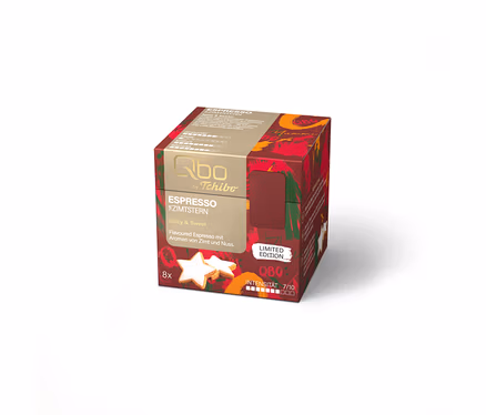 Qbo ES Zimtstern 8 Cup Espresso-Kapselpackung in Rot und Gold mit Zimtstern-Keksen und der Aufschrift "Limited Edition".