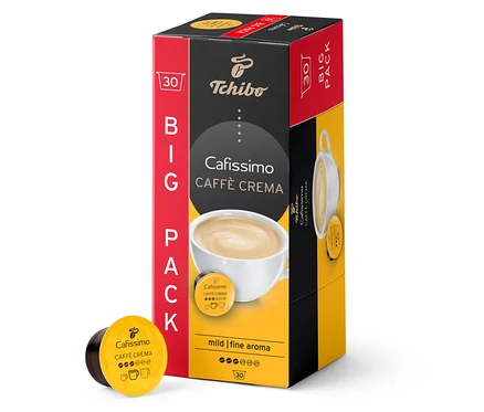 Packung mit 30 Kapseln Cafissimo Caffè Crema mild. Die Schachtel ist rot-schwarz-gelb. Eine Kapsel liegt neben der Packung.