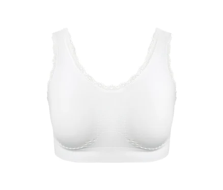 Ein weißes Seamless-Bustier mit Spitze liegt auf einem weißen Hintergrund.