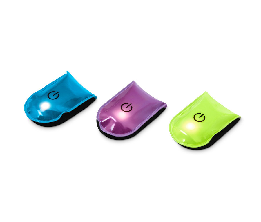 Drei LED-Magnet-Lichter in blau, lila und grün.