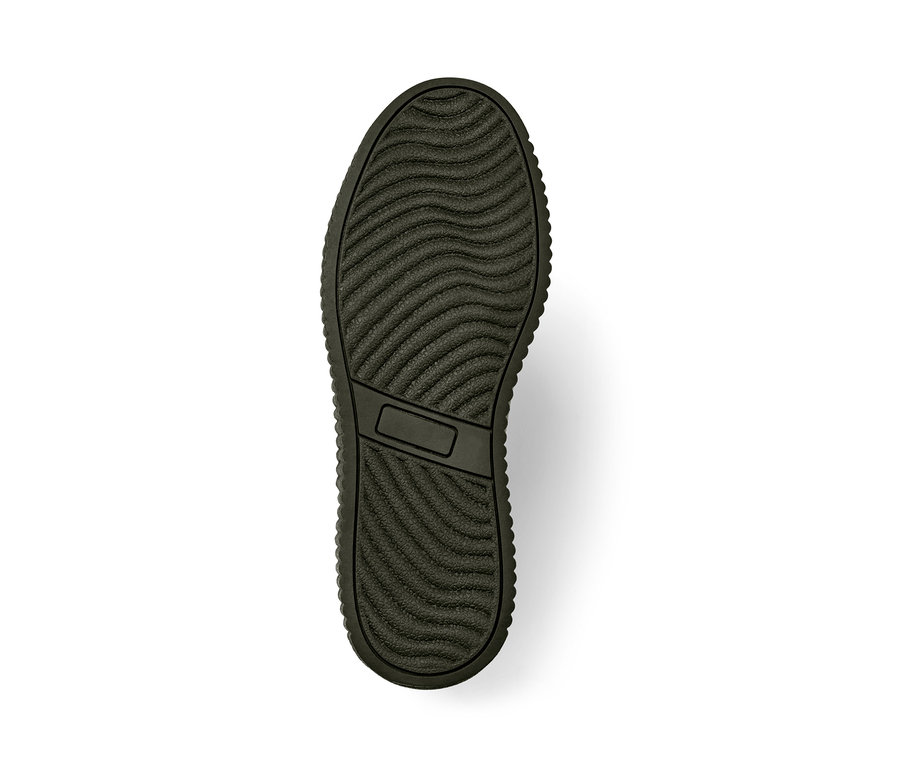 Sohle eines Veloursleder-Boots mit Wellenmuster.