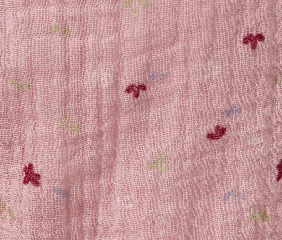 Nahaufnahme einer rosa Baby-Schlupfhose mit kleinem Muster.