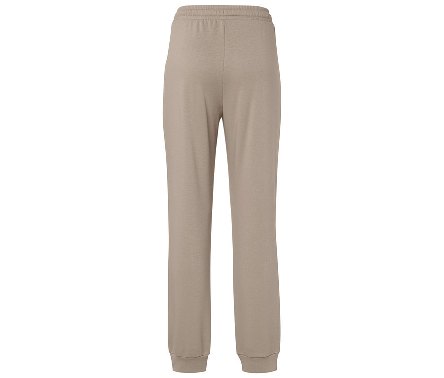 Beige Trainingshose mit elastischem Bund und Bündchen.
