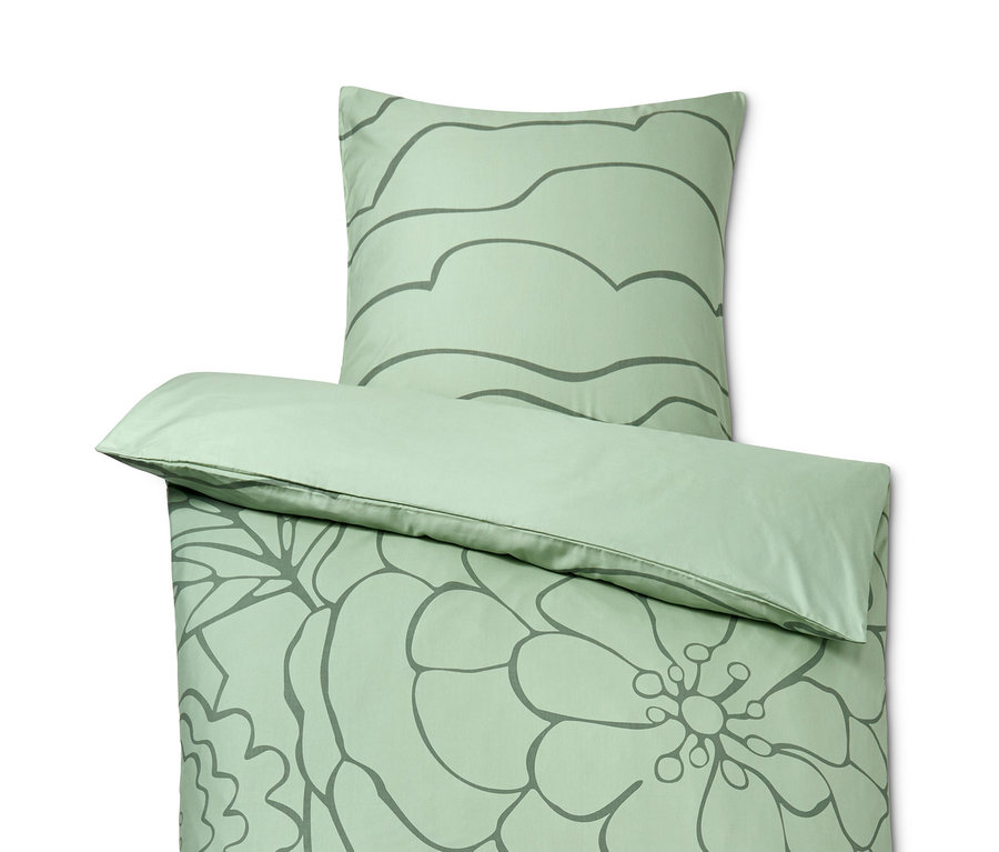 Grüne Tencel™-Baumwoll-Bettwäsche mit Blumen- und Blättermuster.