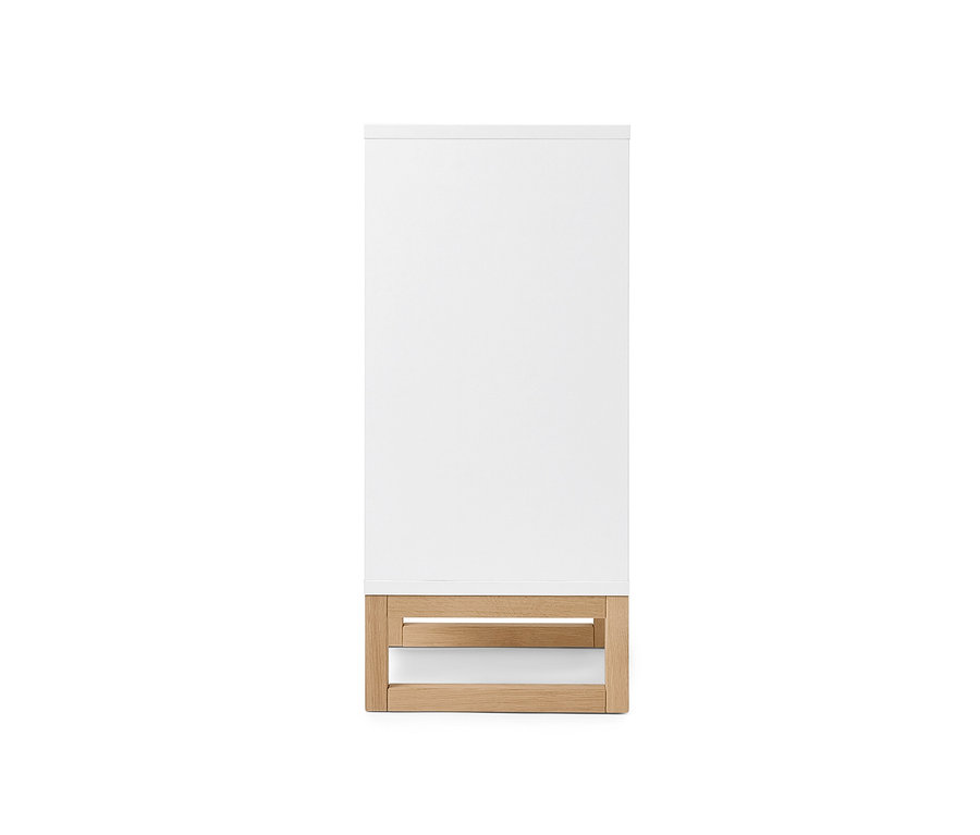 Kleiner Waschbeckenunterschrank mit Tür.