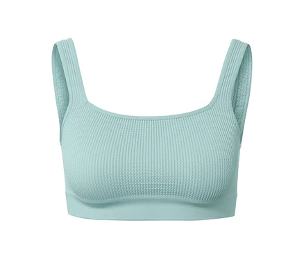 Ein helltürkises Seamless-Bustier mit Struktur.