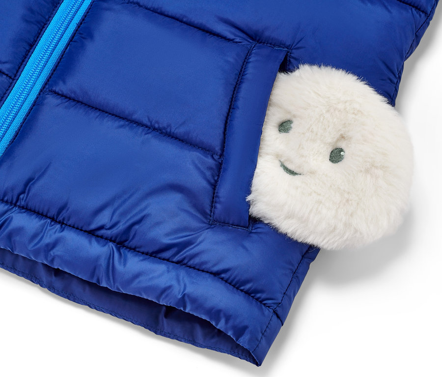 Blaue Weste mit 2 Taschenheizkissen.