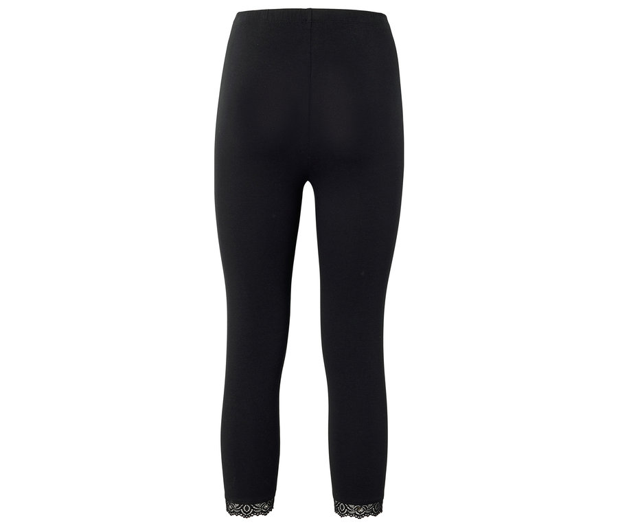 Schwarze Leggings mit Spitzenbesatz am Beinabschluss.