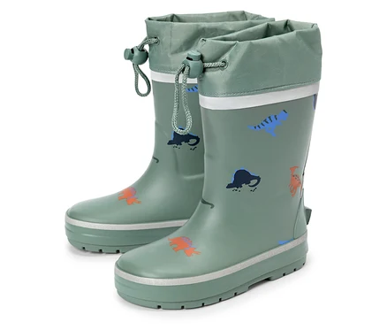 Paar grüne Gummistiefel mit Dinosaurier-Motiven und Kordelzug am Schaft.