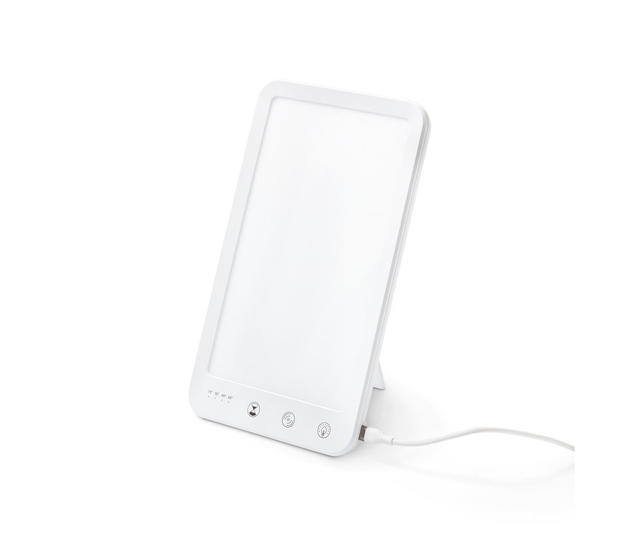 Eine weiße Tageslichtlampe steht vor einem weißen Hintergrund.