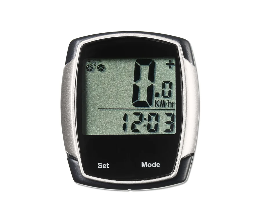 Nahaufnahme eines schwarzen und silbernen Fahrradcomputers, der 0,0 km/h und eine Zeit von 12:03 anzeigt.