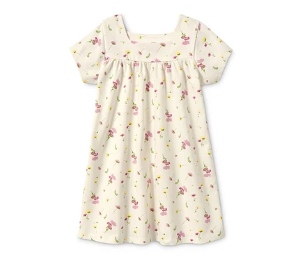 Ein Jerseykleid aus Bio-Baumwolle mit Blumenmuster.