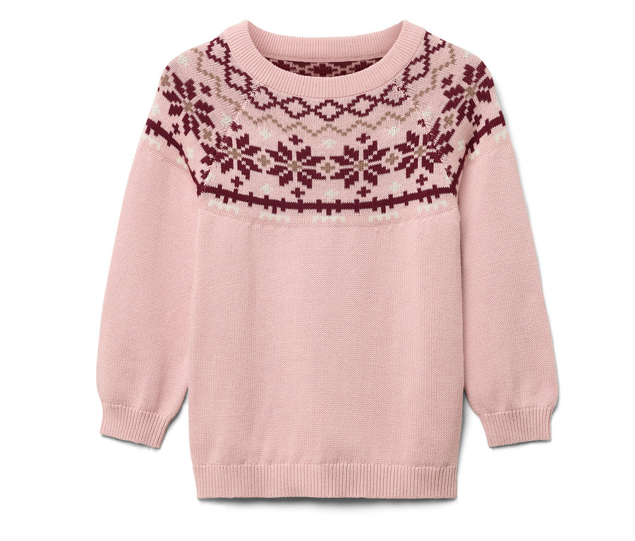 Rosa Pullover mit Weihnachtsmuster.