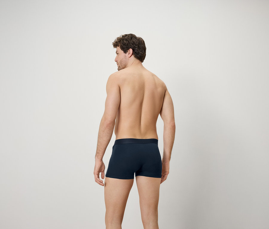 Mann von hinten trägt 7 Slipboxer.