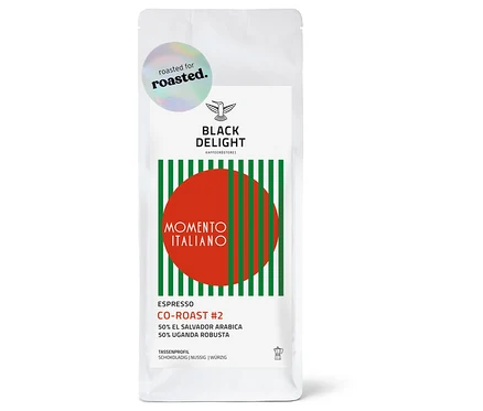 Eine 250-g-Packung gemahlener Black Delight x roasted. - Momento Italiano Co-Roast #2 Espresso.