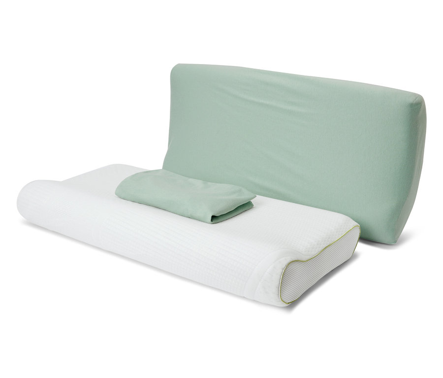 Zwei grüne Jersey-Nackenkissenbezüge liegen auf einem weißen Kissen.