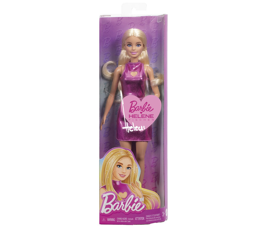 Barbie-Puppe in Verpackung mit blonden Haaren und glänzendem pinkfarbenem Kleid, auf der Schachtel steht "Barbie Helene Fischer".