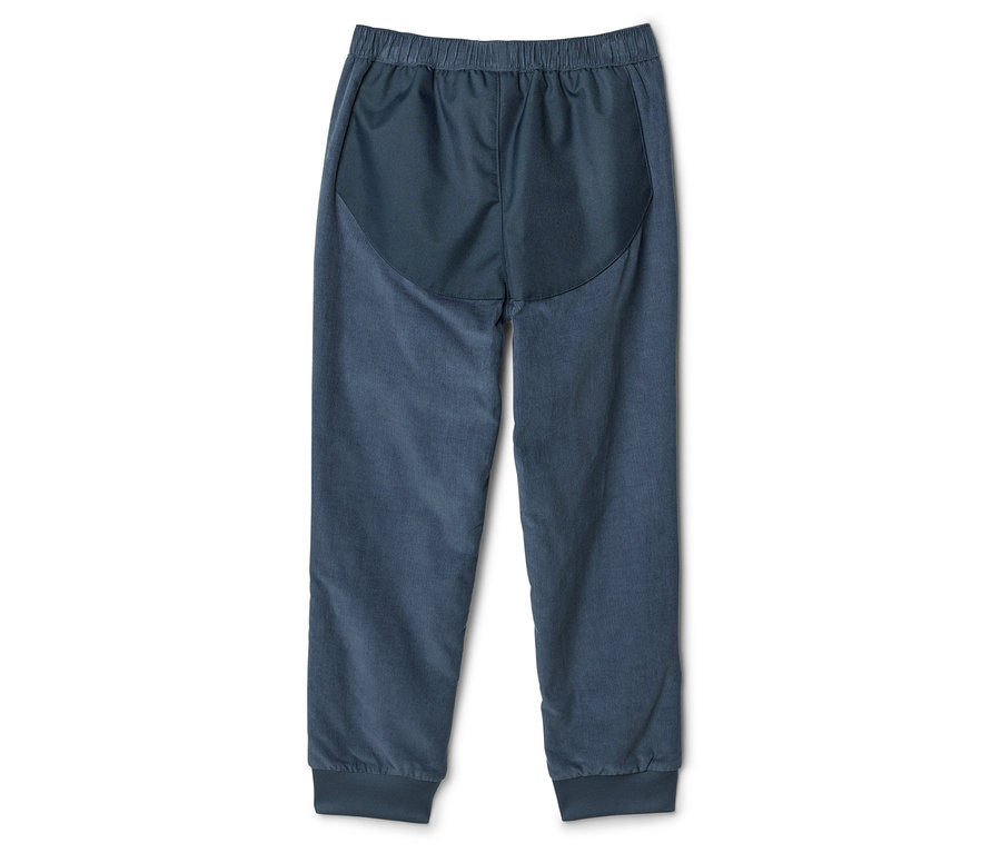 Dunkelblaue Hose mit elastischem Bund und Bündchen an den Knöcheln, von hinten fotografiert.