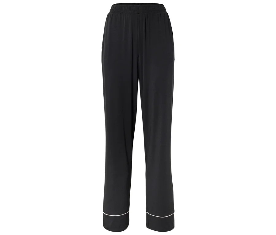 Schwarze weite Hose mit elastischem Bund und hellem Saum an den Beinabschlüssen.