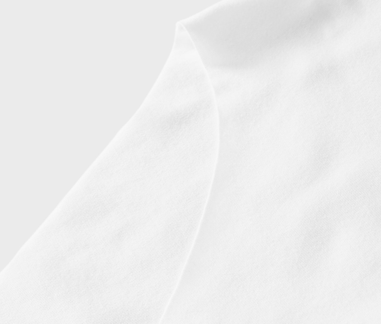 Detailaufnahme eines weißen Stoffes.