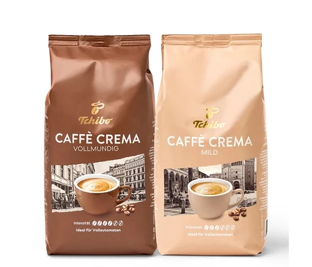 Zwei Packungen Caffè Crema Bestseller-Set - Ganze Bohne von Tchibo. Eine Packung ist braun, die andere beige.