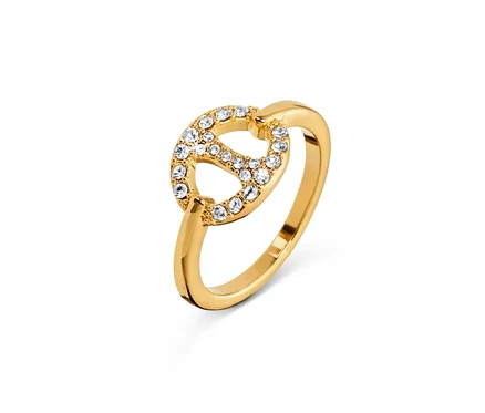 Goldener Ring Schiffsanker mit Glaskristallen auf weißem Hintergrund.