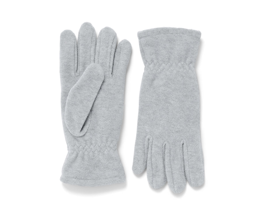 Zwei graue Fleece-Handschuhe liegen nebeneinander.