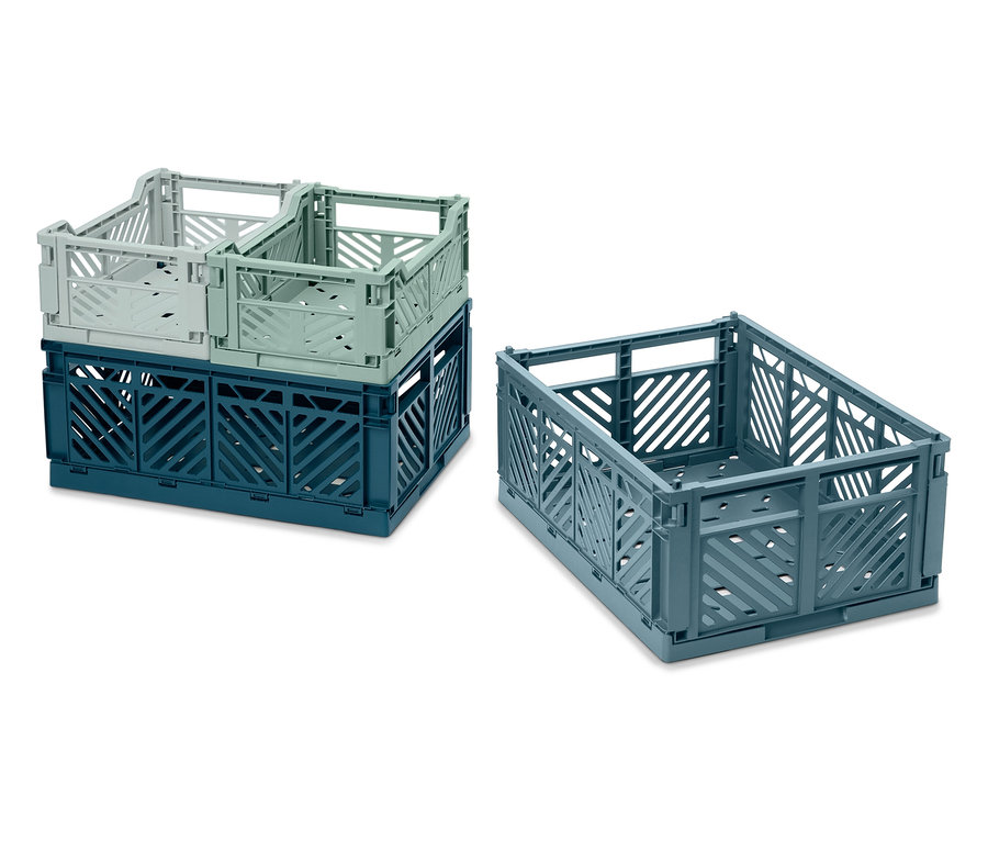 Zwei stapelbare Faltboxen, eine blaue und eine graue, und eine einzelne graue Box daneben.