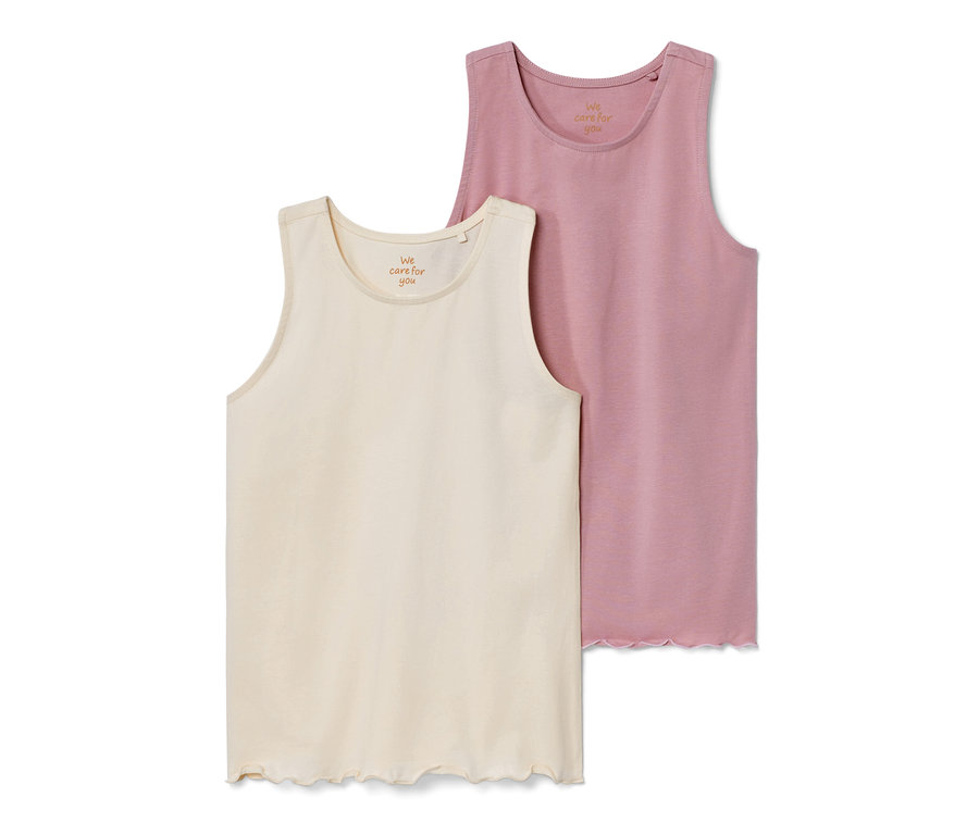 Zwei Kinder-Tops: ein cremefarbenes und ein rosa Top.