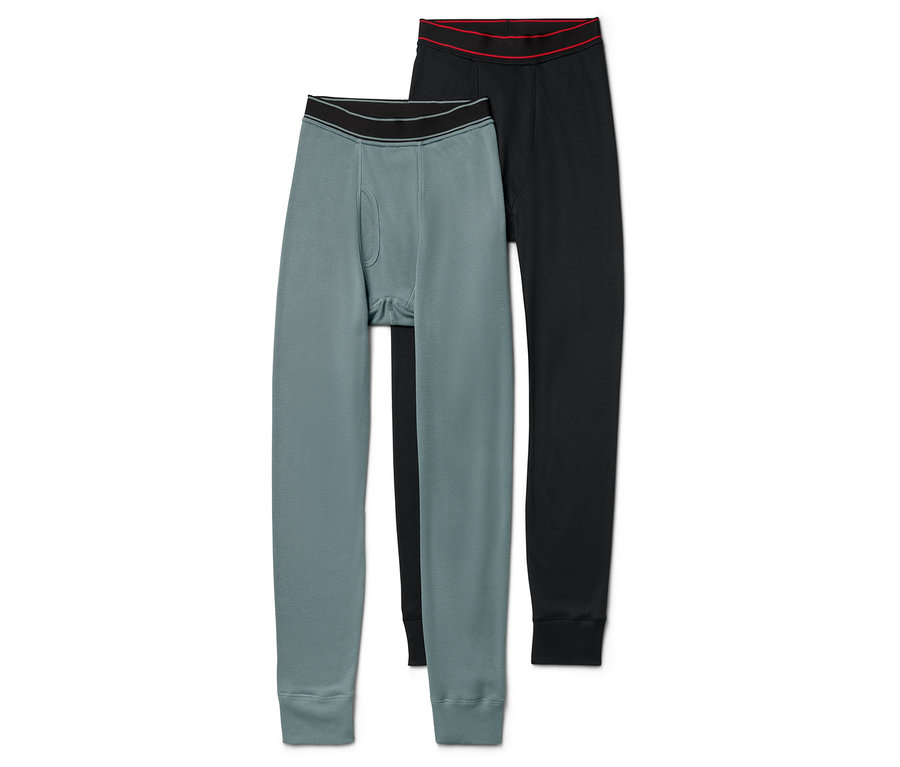 Zwei Herren Thermohosen: eine graugrüne und eine schwarze.