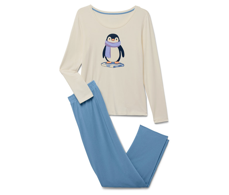 Beiger Pyjama mit langen Ärmeln und blauen Hosen. Auf dem Shirt ist ein Pinguin mit einem lila Schal abgebildet.