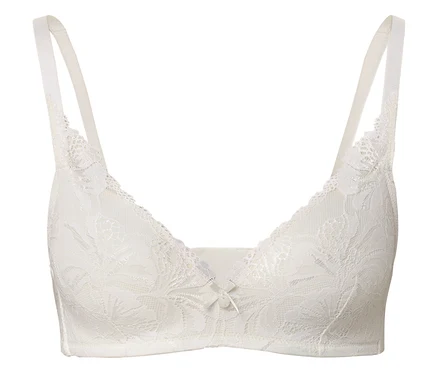 Weißer Spitzen-BH mit Schleife in der Mitte.