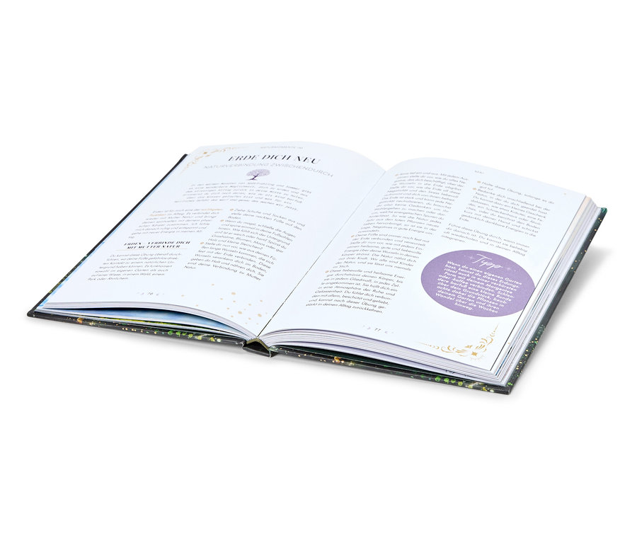 Ein geöffnetes Buch mit Text und einem lila Kreis auf der Seite.